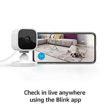 Blink Mini – Compact indoor plug-in smart security camera, 1080p HD video, night vision, motion detection, two-way audio, easy set up, Works with Alexa – 1 camera (White)